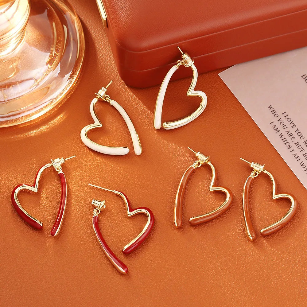 Classic Hong Kong-style heart-shaped oil-dropping ear studs, simple and high-end, fashionable and romantic earrings, niche