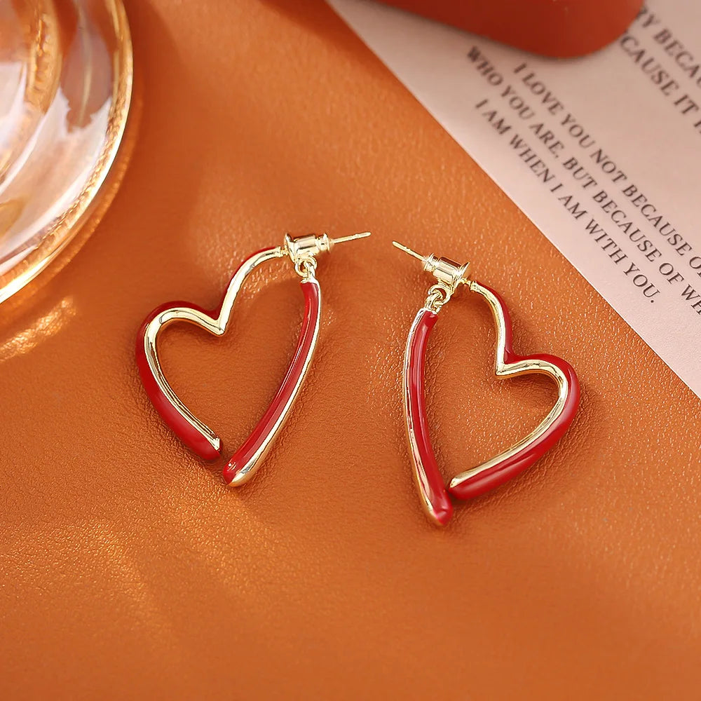 Classic Hong Kong-style heart-shaped oil-dropping ear studs, simple and high-end, fashionable and romantic earrings, niche