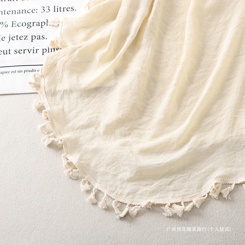 Cross-border new holiday hook solid color stitching European and American beach skirt small tassel sunscreen short sexy beach blouse