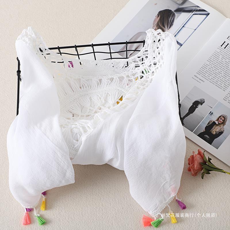 Cross-border new holiday hook solid color stitching European and American beach skirt small tassel sunscreen short sexy beach blouse