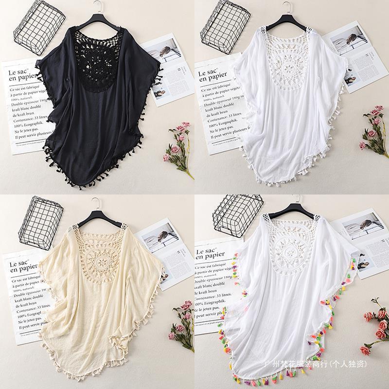 Cross-border new holiday hook solid color stitching European and American beach skirt small tassel sunscreen short sexy beach blouse