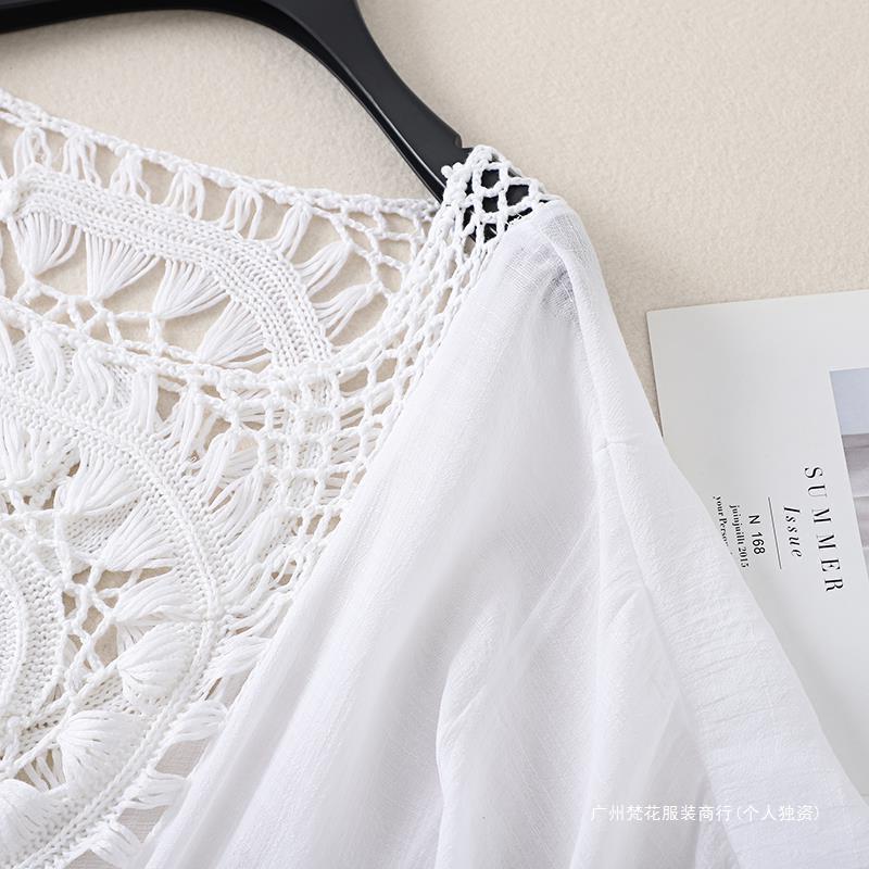 Cross-border new holiday hook solid color stitching European and American beach skirt small tassel sunscreen short sexy beach blouse