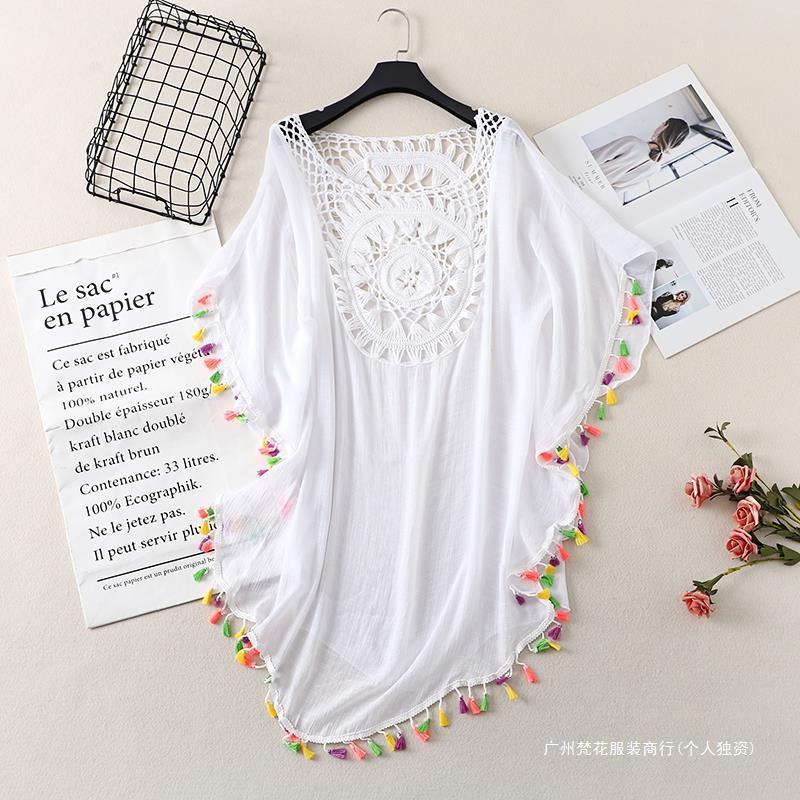 Cross-border new holiday hook solid color stitching European and American beach skirt small tassel sunscreen short sexy beach blouse