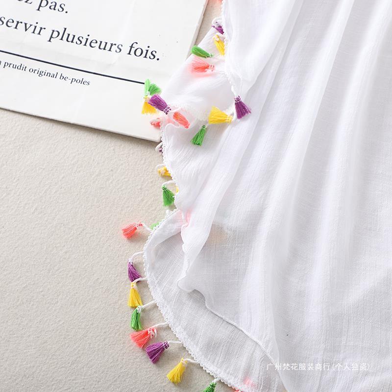 Cross-border new holiday hook solid color stitching European and American beach skirt small tassel sunscreen short sexy beach blouse