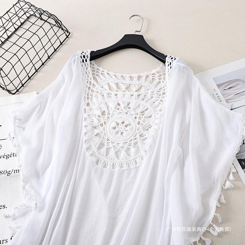 Cross-border new holiday hook solid color stitching European and American beach skirt small tassel sunscreen short sexy beach blouse