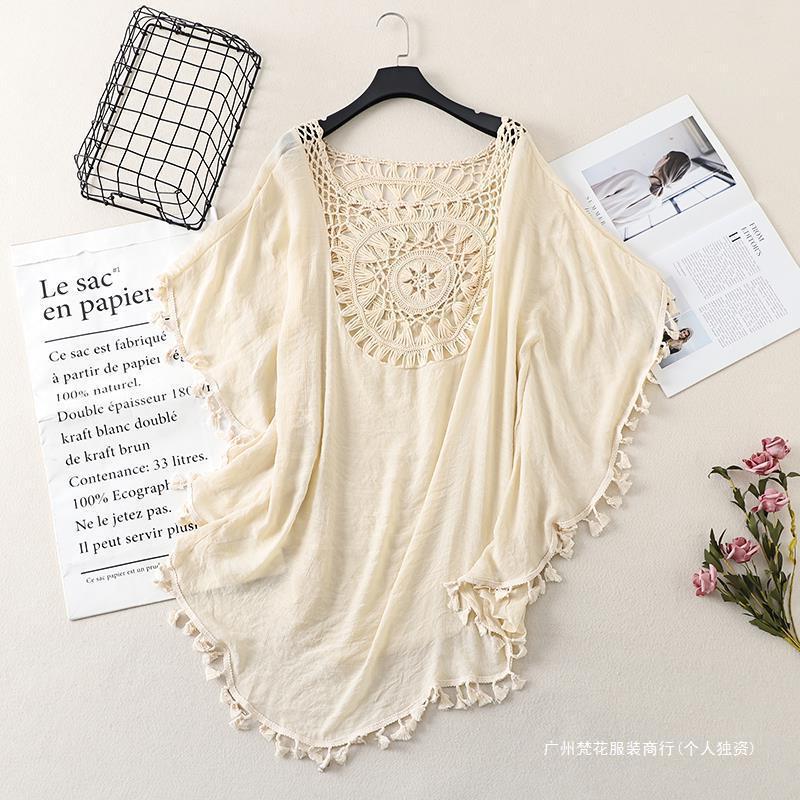 Cross-border new holiday hook solid color stitching European and American beach skirt small tassel sunscreen short sexy beach blouse