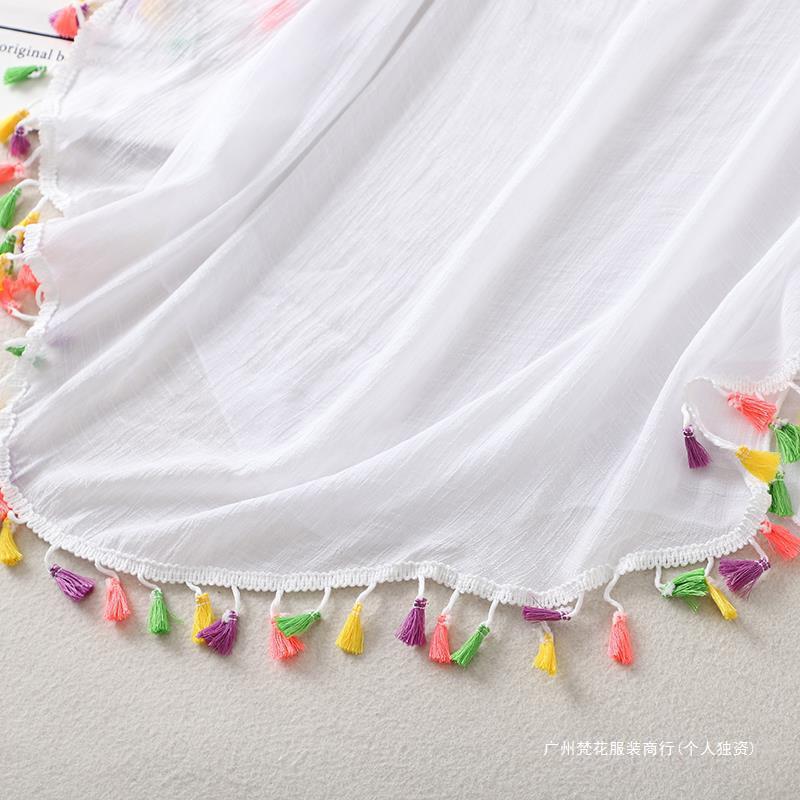 Cross-border new holiday hook solid color stitching European and American beach skirt small tassel sunscreen short sexy beach blouse