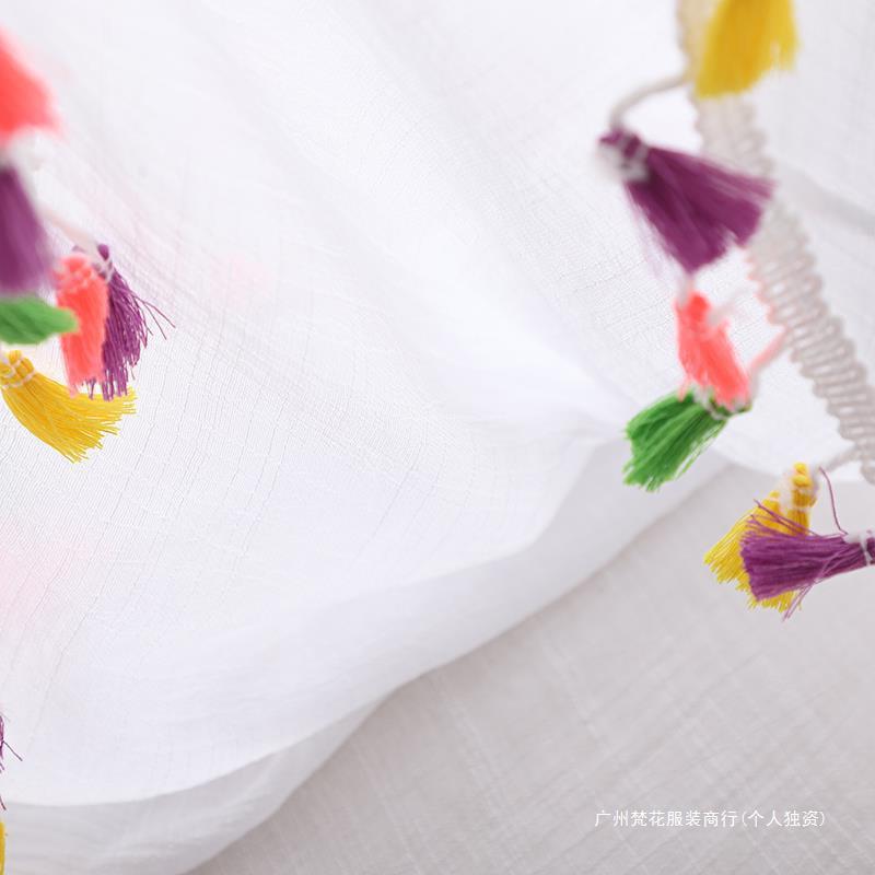 Cross-border new holiday hook solid color stitching European and American beach skirt small tassel sunscreen short sexy beach blouse