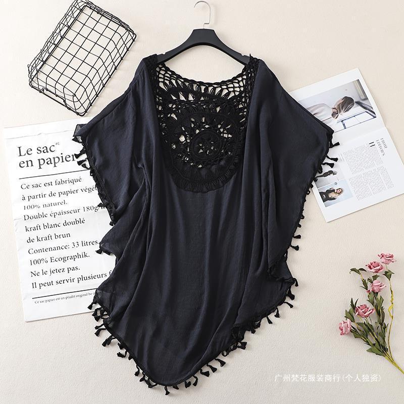 Cross-border new holiday hook solid color stitching European and American beach skirt small tassel sunscreen short sexy beach blouse