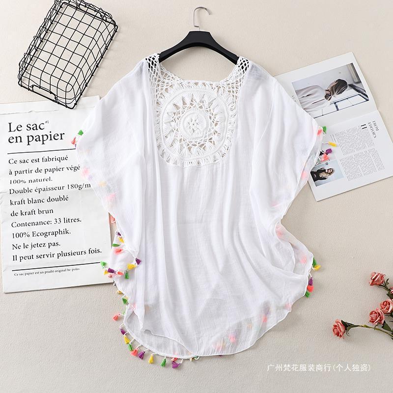 Cross-border new holiday hook solid color stitching European and American beach skirt small tassel sunscreen short sexy beach blouse