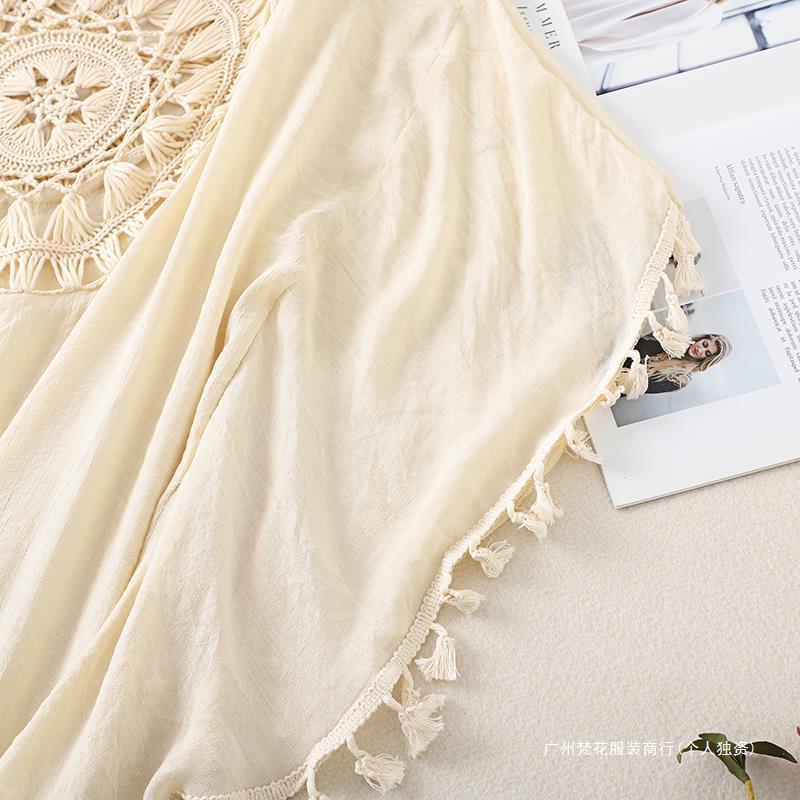 Cross-border new holiday hook solid color stitching European and American beach skirt small tassel sunscreen short sexy beach blouse