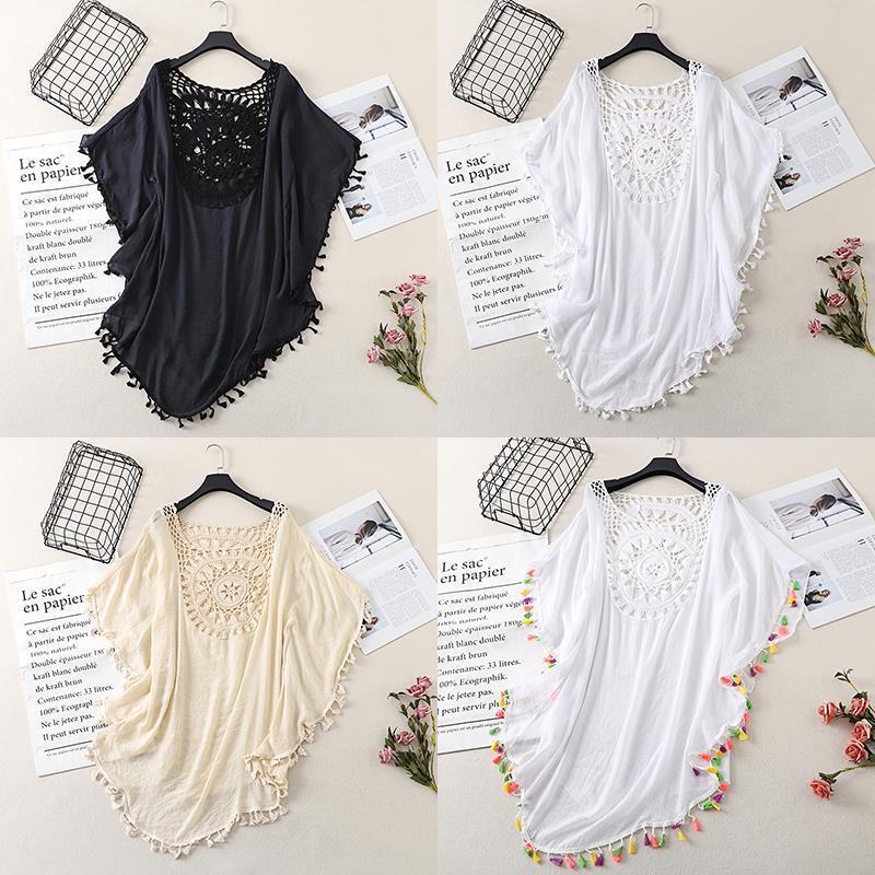 Cross-border new holiday hook solid color stitching European and American beach skirt small tassel sunscreen short sexy beach blouse