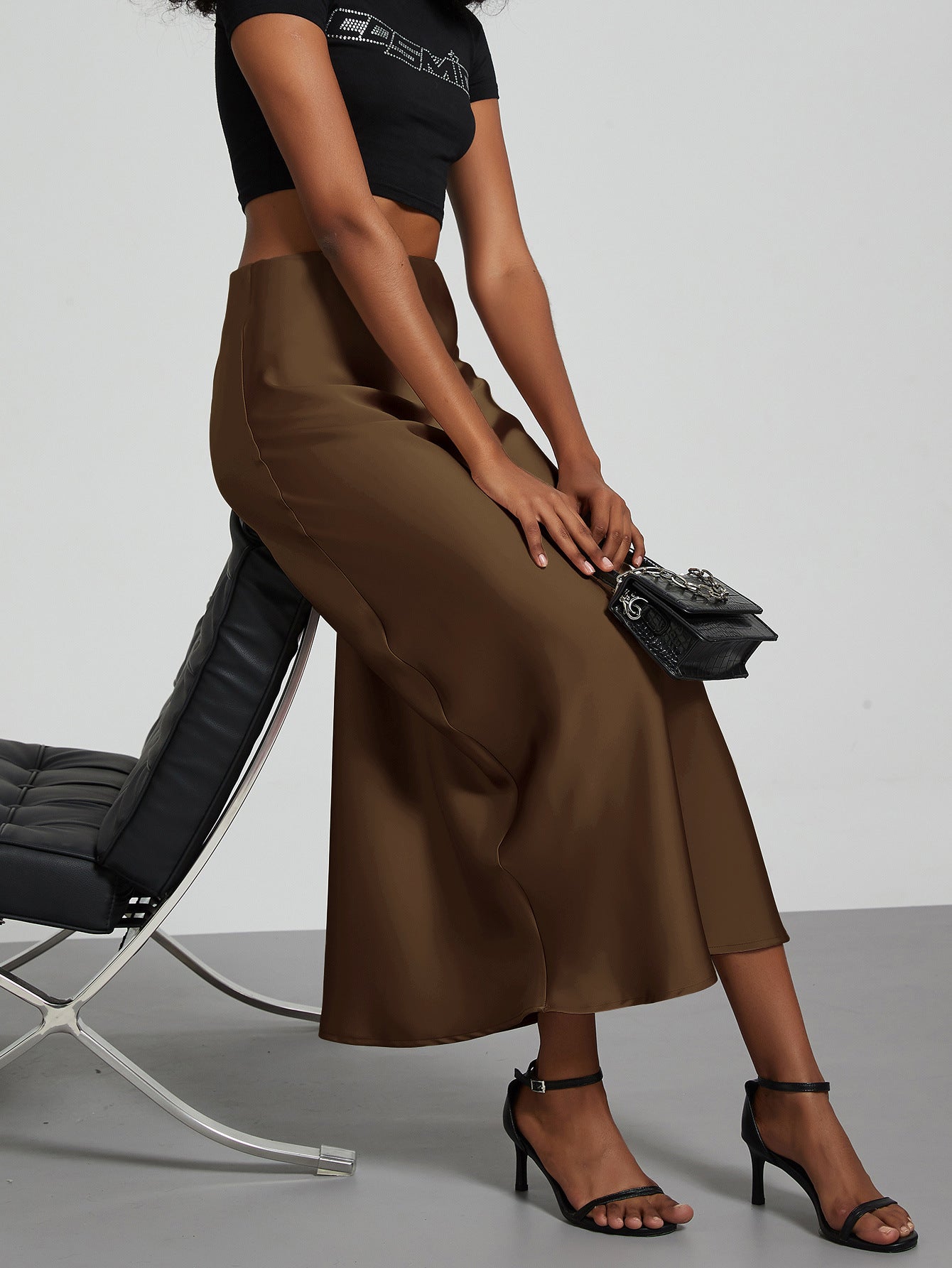 Cross-border women's clothing wholesale European and American style fashion temperament satin texture skirt Joker solid color glossy mid-length skirt