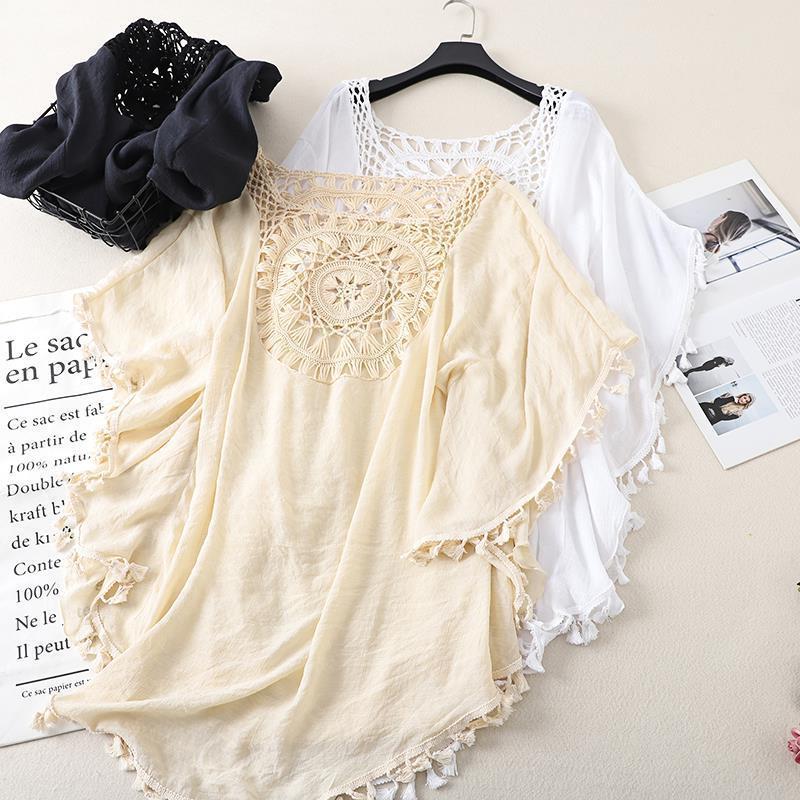 Cross-border new holiday hook solid color stitching European and American beach skirt small tassel sunscreen short sexy beach blouse