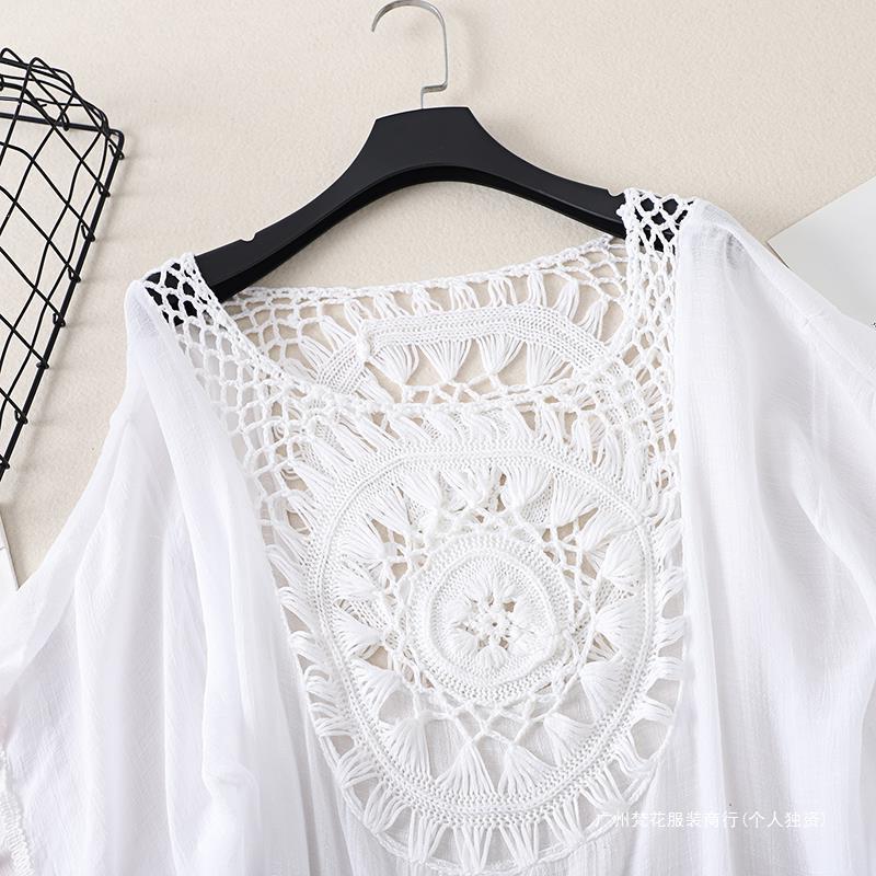 Cross-border new holiday hook solid color stitching European and American beach skirt small tassel sunscreen short sexy beach blouse