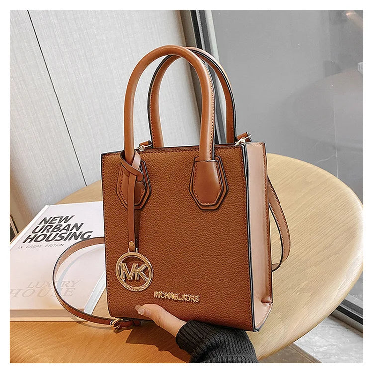 2026 New Michael Kors Women's Fashion One Shoulder Handbag MK Cross Shoulder Vertical Small Square Bag Classic Letter Bag