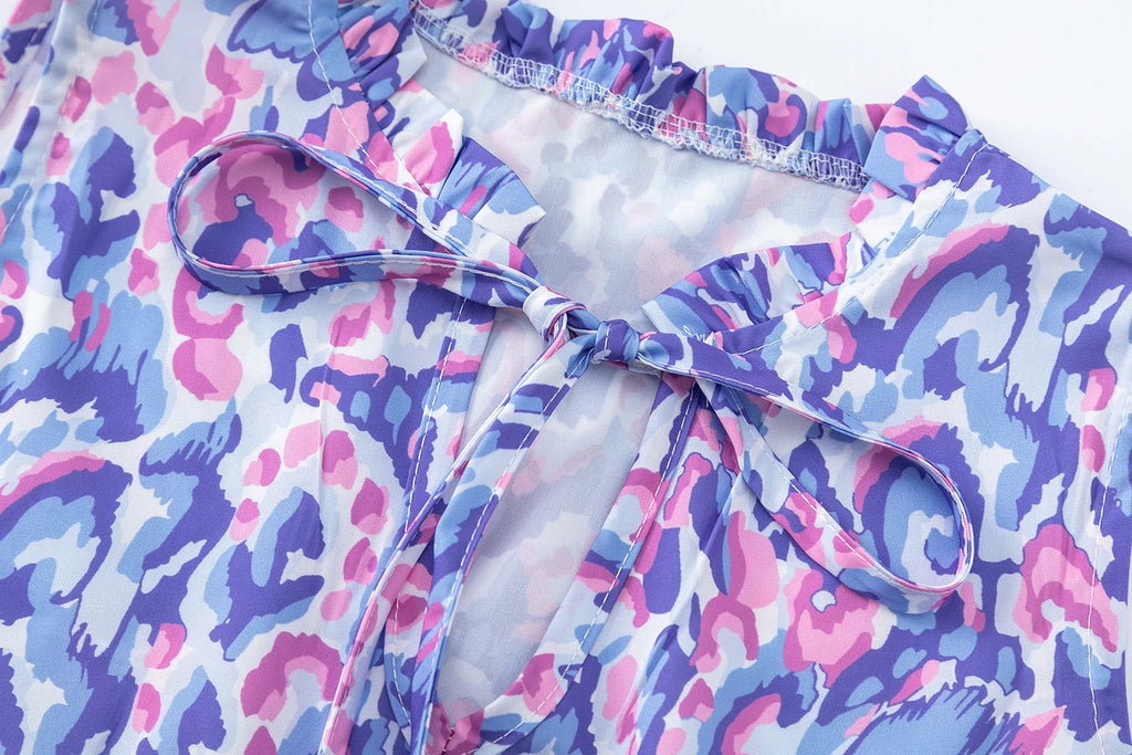 New European and American Summer Cross-border Seaside Vacation Mid to Long Sleeveless V-neck Tassel Abstract Print Dress