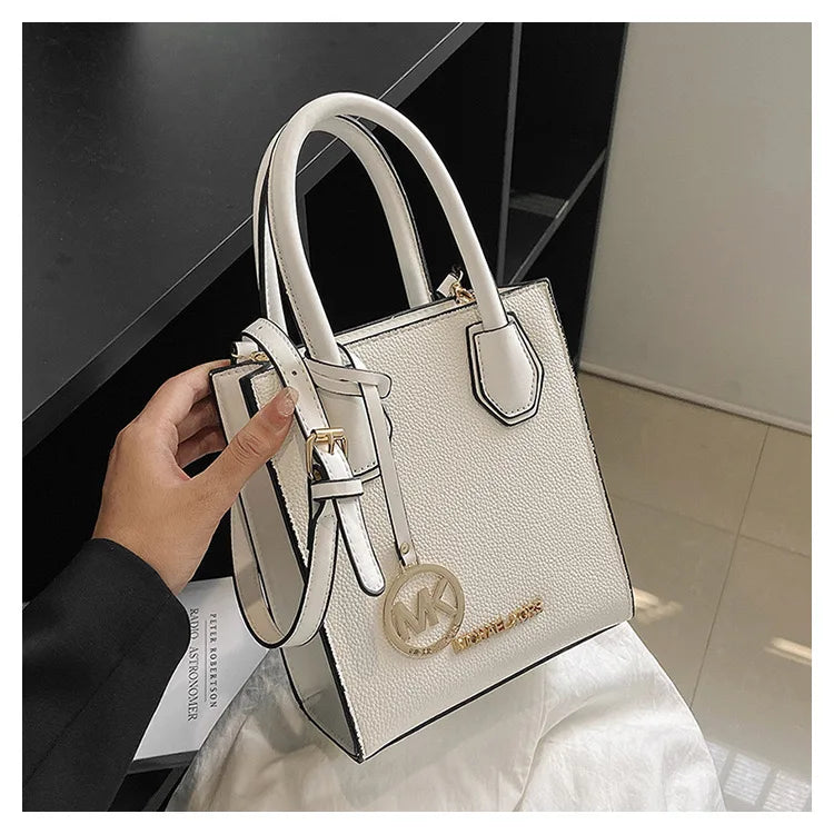 2026 New Michael Kors Women's Fashion One Shoulder Handbag MK Cross Shoulder Vertical Small Square Bag Classic Letter Bag