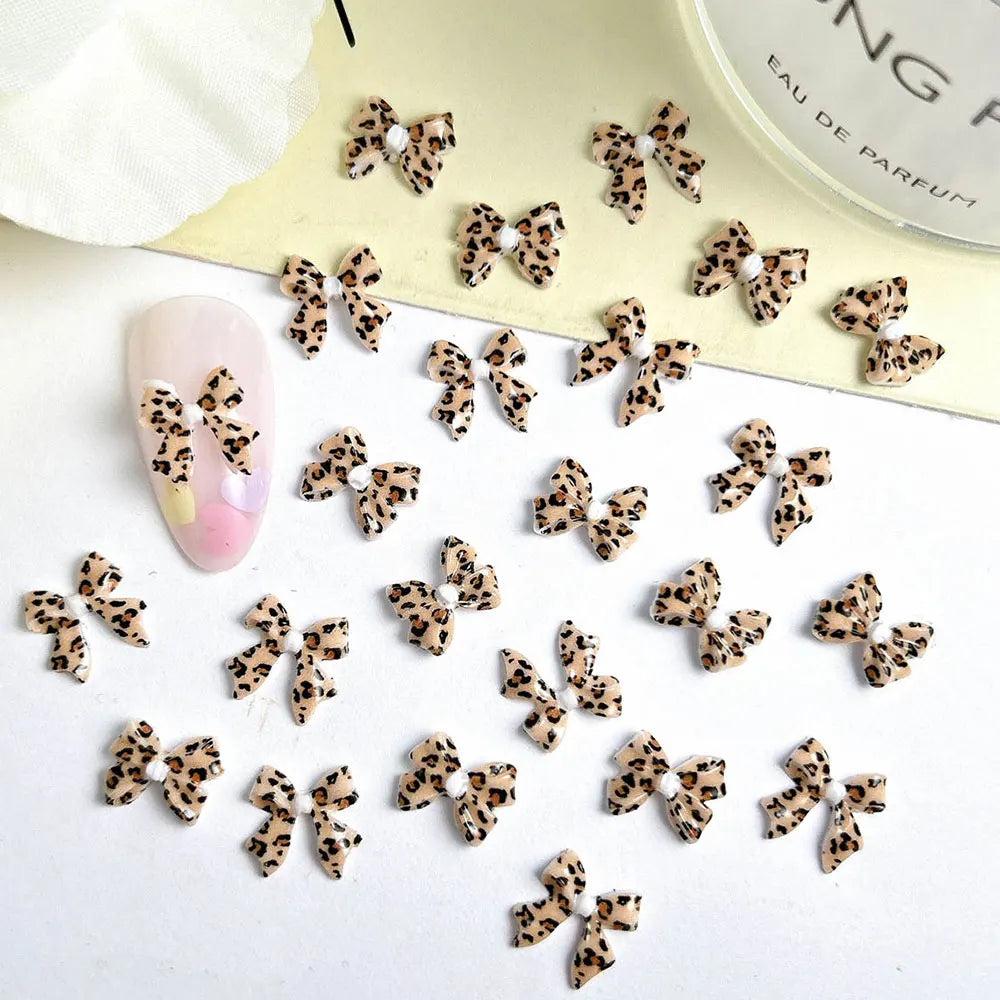 50pcs Leopard Print Bow Nail Art Decorations 10mm 3D Resin Leopard Ribbon Nail Charms Leopard Designs Acrylic Nail Art Supplies
