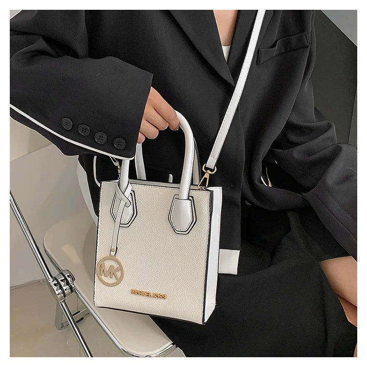2026 New Michael Kors Women's Fashion One Shoulder Handbag MK Cross Shoulder Vertical Small Square Bag Classic Letter Bag