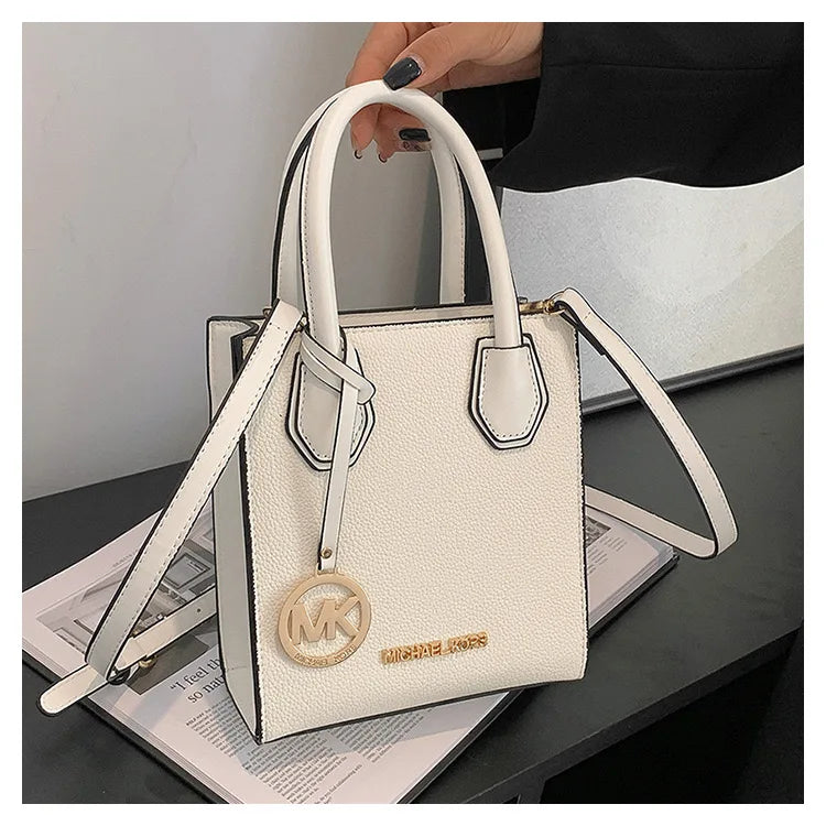2026 New Michael Kors Women's Fashion One Shoulder Handbag MK Cross Shoulder Vertical Small Square Bag Classic Letter Bag