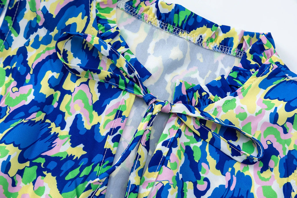 New European and American Summer Cross-border Seaside Vacation Mid to Long Sleeveless V-neck Tassel Abstract Print Dress