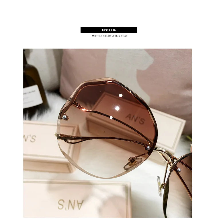 Women's Rimless Round Gradient Sunglasses 2026 New Trend UV400 Protection Anti Glare Metal Curved Temples Ocean Lens Eyewear