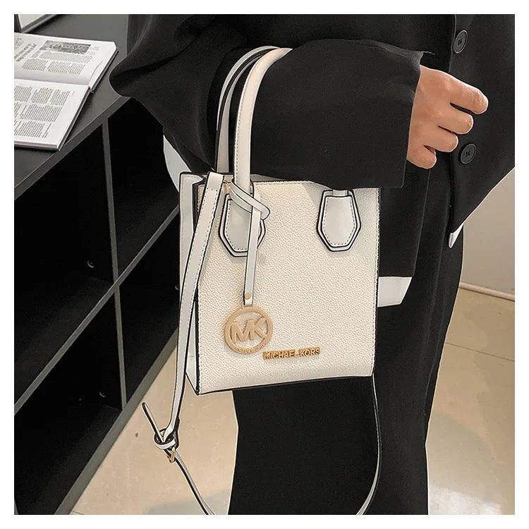 2026 New Michael Kors Women's Fashion One Shoulder Handbag MK Cross Shoulder Vertical Small Square Bag Classic Letter Bag