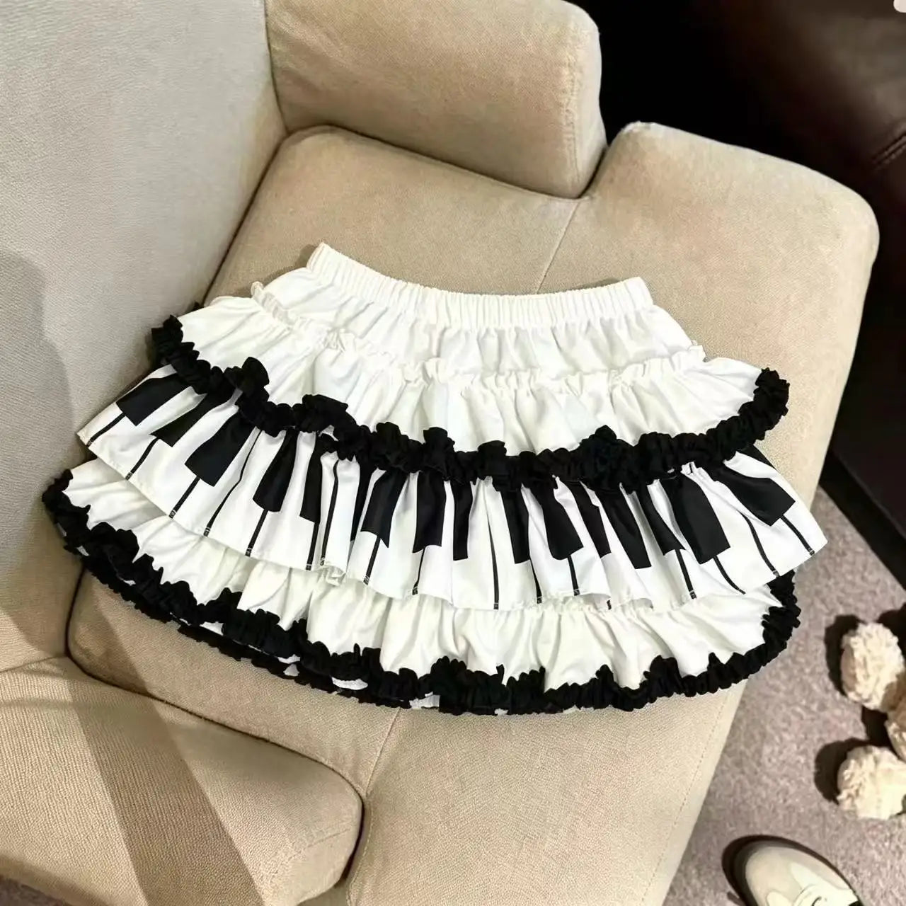 Y2K Black White Print Mini Skirt Women Slim Design Ruffle Layered A Line Skirt Elastic Waist Harajuku Pleated Short Piano Skirts