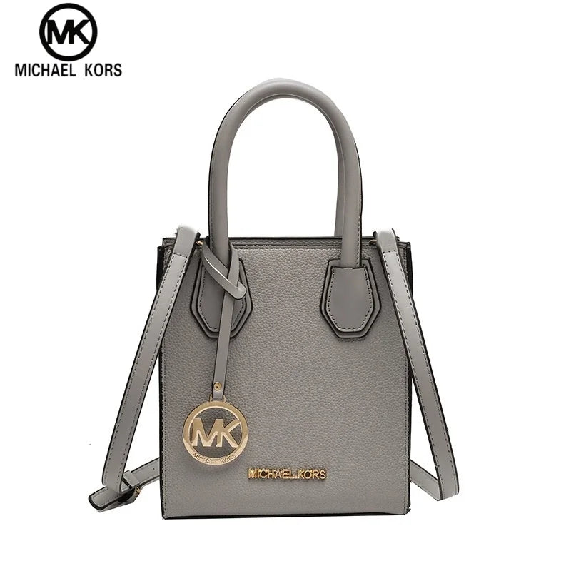2026 New Michael Kors Women's Fashion One Shoulder Handbag MK Cross Shoulder Vertical Small Square Bag Classic Letter Bag
