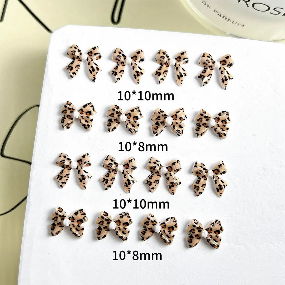50pcs Leopard Print Bow Nail Art Decorations 10mm 3D Resin Leopard Ribbon Nail Charms Leopard Designs Acrylic Nail Art Supplies