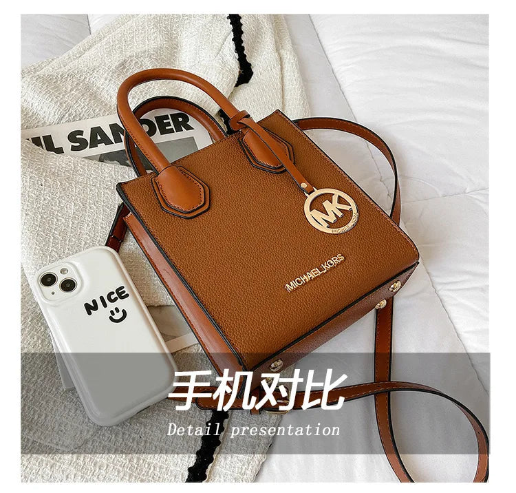 2026 New Michael Kors Women's Fashion One Shoulder Handbag MK Cross Shoulder Vertical Small Square Bag Classic Letter Bag