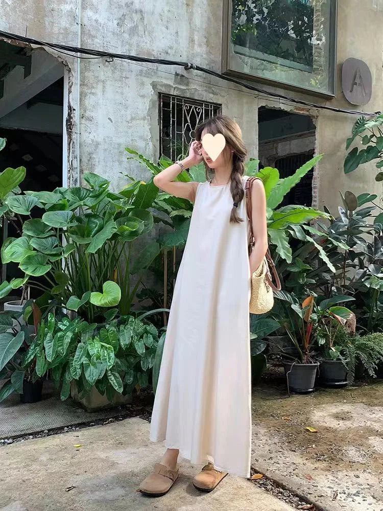 Korean-style elegant sleeveless spring dress for women, loose fit with hollow back design, round neck, long tank dress
