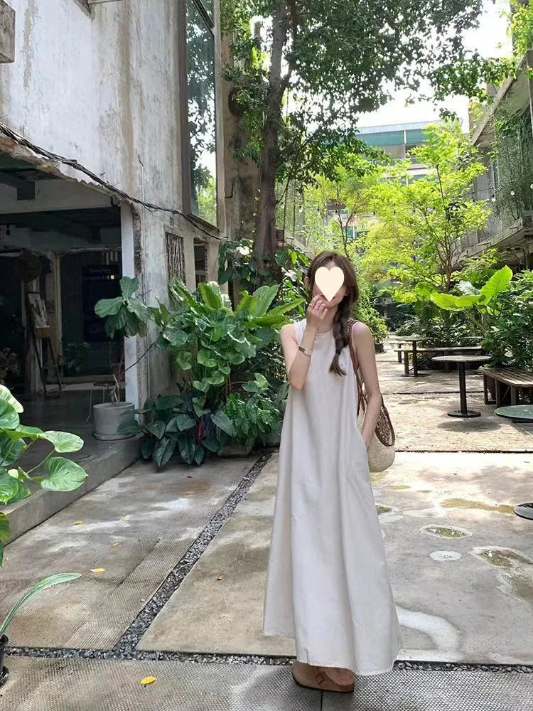 Korean-style elegant sleeveless spring dress for women, loose fit with hollow back design, round neck, long tank dress