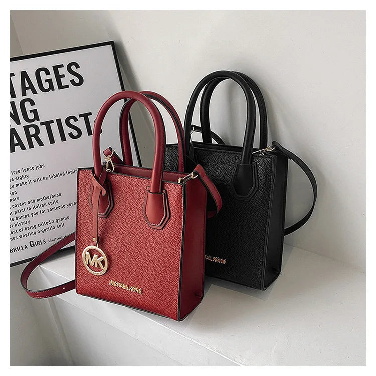 2026 New Michael Kors Women's Fashion One Shoulder Handbag MK Cross Shoulder Vertical Small Square Bag Classic Letter Bag