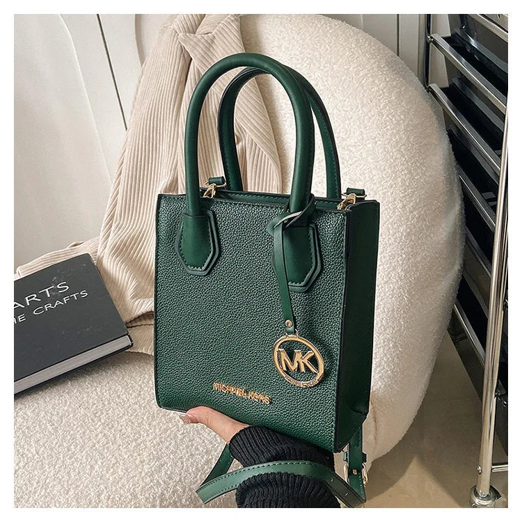 2026 New Michael Kors Women's Fashion One Shoulder Handbag MK Cross Shoulder Vertical Small Square Bag Classic Letter Bag