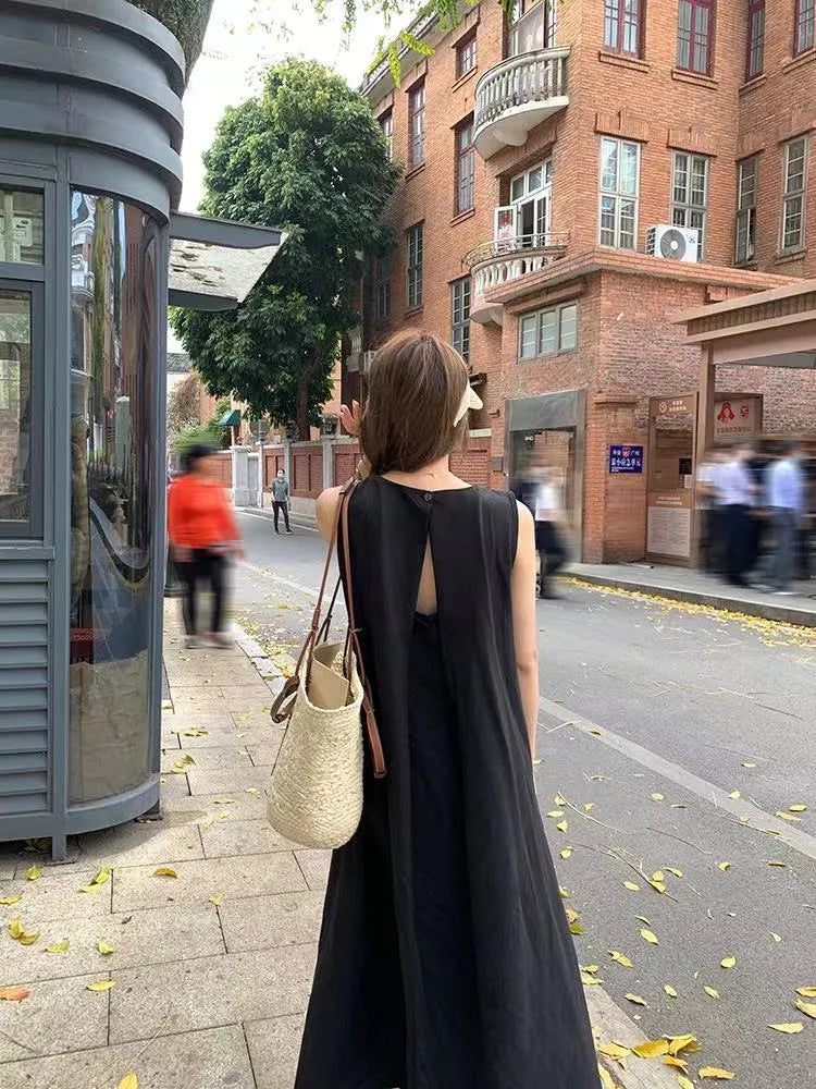 Korean-style elegant sleeveless spring dress for women, loose fit with hollow back design, round neck, long tank dress