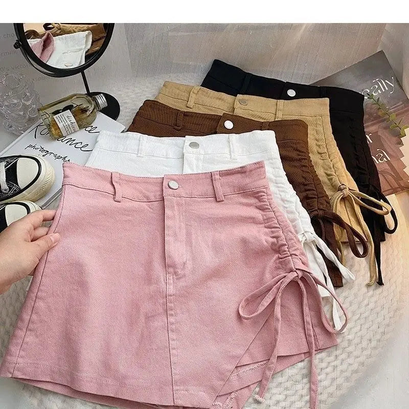 Korean style pink denim skirt female summer new design sense irregular drawstring casual fashion temperament slim A-line skirt.