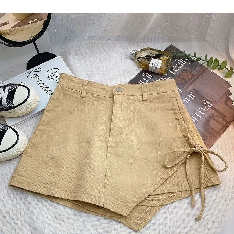 Korean style pink denim skirt female summer new design sense irregular drawstring casual fashion temperament slim A-line skirt.