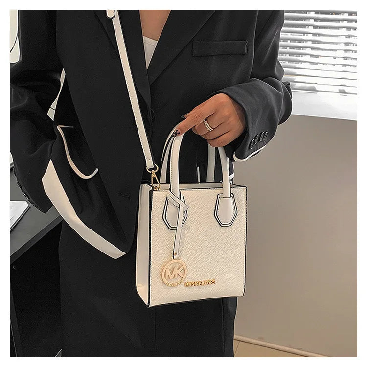 2026 New Michael Kors Women's Fashion One Shoulder Handbag MK Cross Shoulder Vertical Small Square Bag Classic Letter Bag