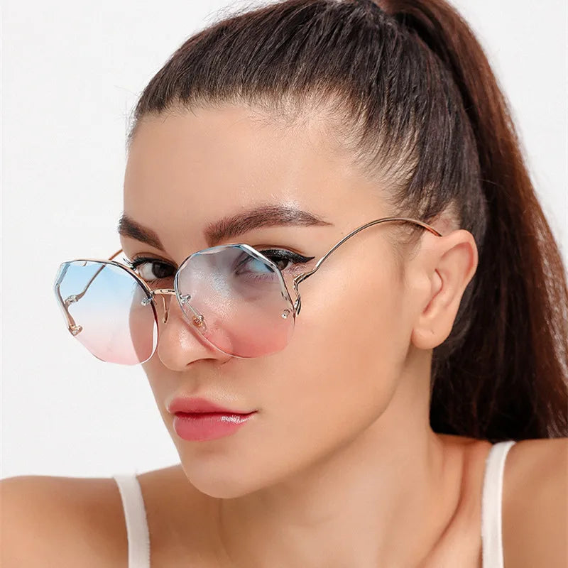 Women's Rimless Round Gradient Sunglasses 2026 New Trend UV400 Protection Anti Glare Metal Curved Temples Ocean Lens Eyewear
