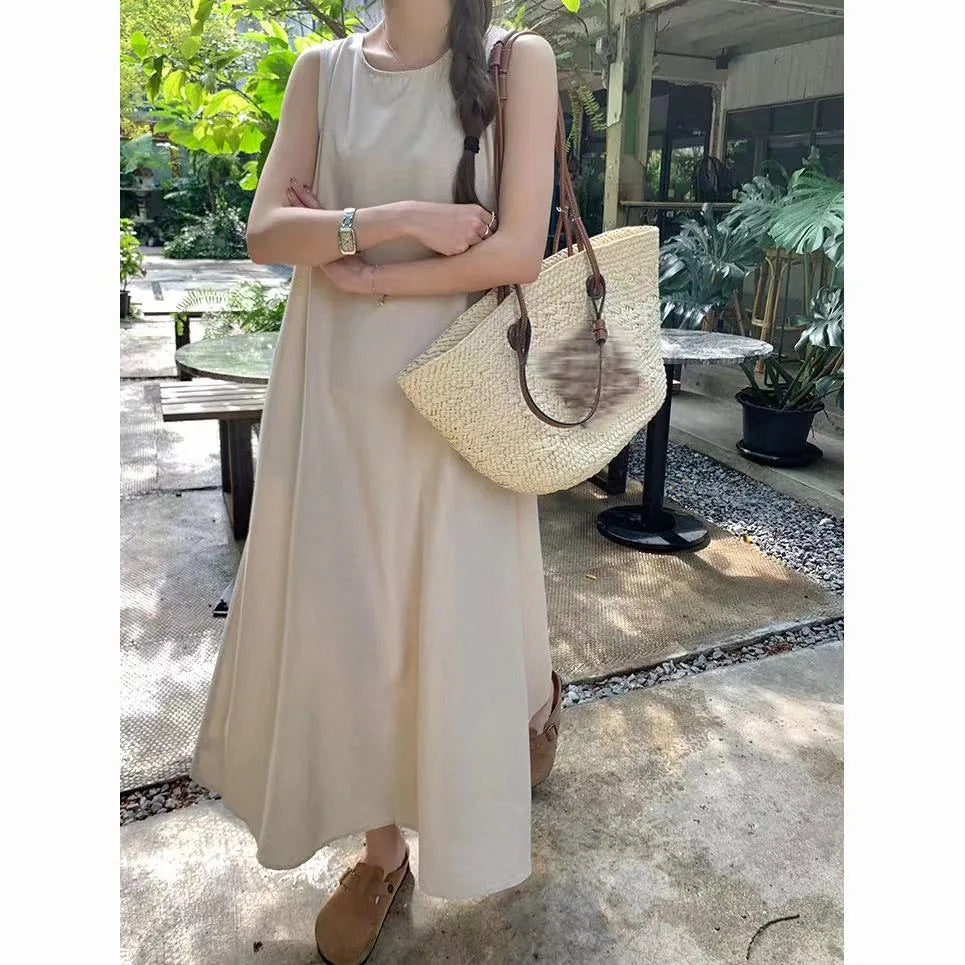 Korean-style elegant sleeveless spring dress for women, loose fit with hollow back design, round neck, long tank dress
