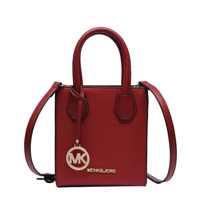 Michael Kors 2026 New Fashion Multi-Functional Women's Handbag and Crossbody Shopping Bag, Mini Crossbody Sheet Music Bag
