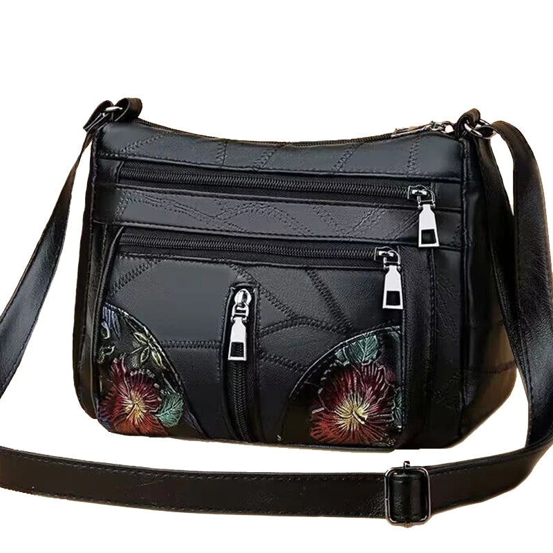 The lady's crossbody bag is made of PU material and features printed patterns, perfect for traveling and shopping.